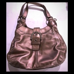 Metallic bronze coach purse